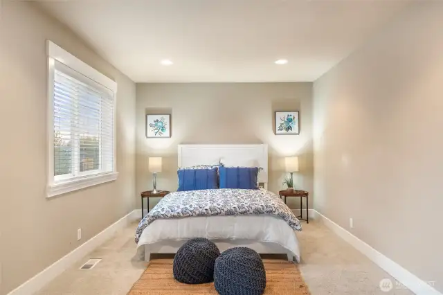 Enclave in primary bedroom for bed.