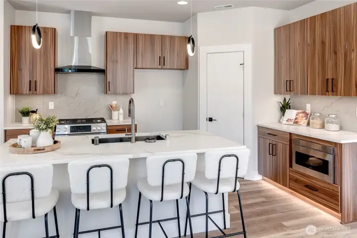 Gas cooking range and toe kick lighting