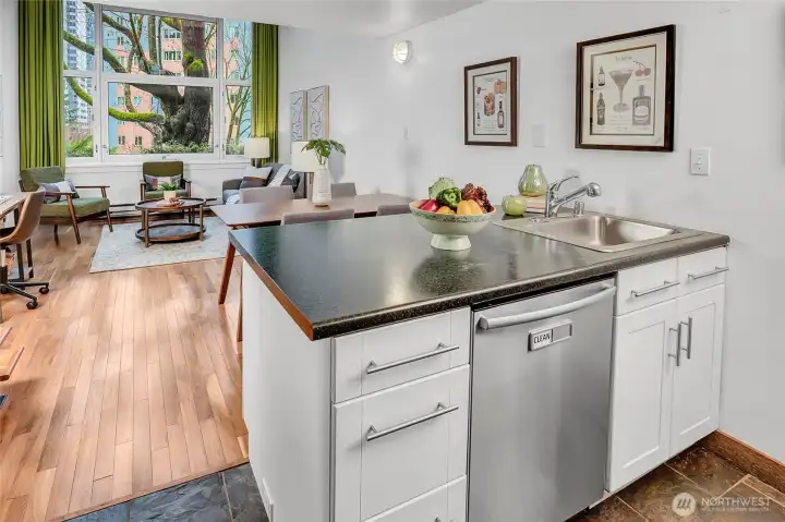 Wall of windows bathes the unit in light