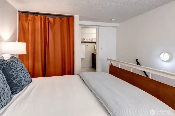 Bedroom with walk in closet