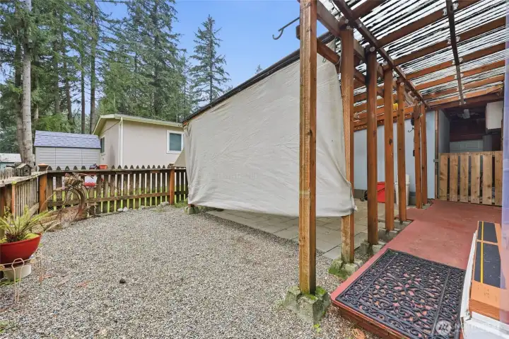 Canvas drape for shade and privacy. Can be rolled up.