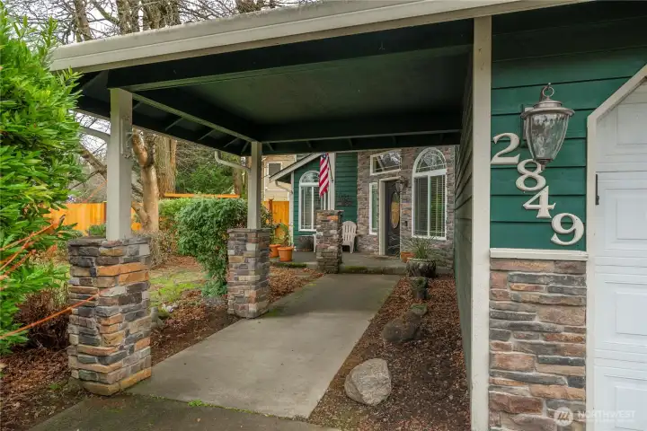 This mostly covered path leads you to the front door