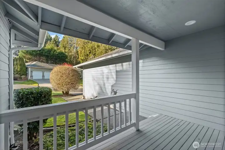 Enjoy all weather conditions presented in the PNW with a covered entryway and front entrance patio.