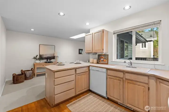 Light-filled kitchen with easy transition to and from entertainment space.