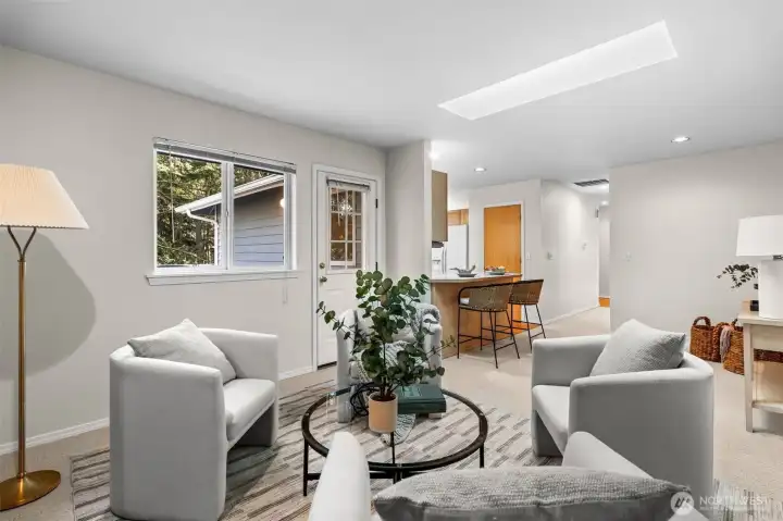 Inviting gathering nook with easy access to outdoor patio and backyard.