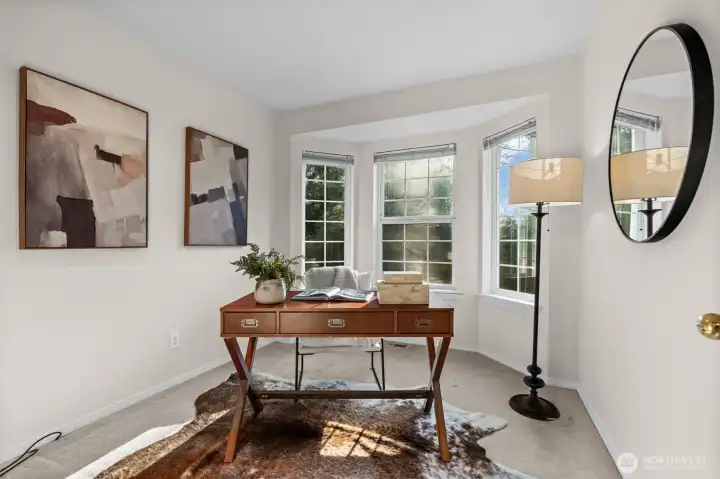 Sun-drenched office creates space for relaxing work-life balance.