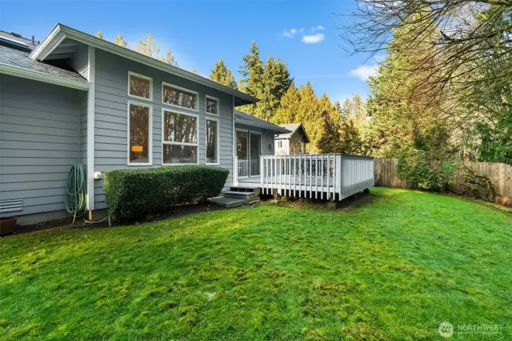 Awesome backyard with easy steps to and from deck maximizes social space.