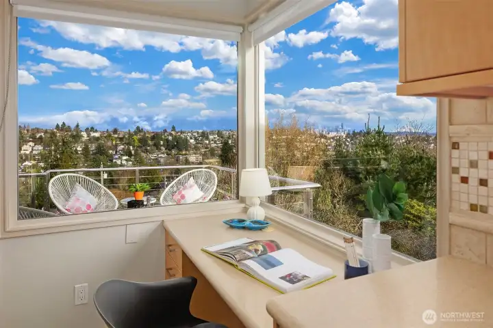 You could be forgiven for losing your focus if this space is actually to be used for work.  I mean, those Acapulco chairs are beckoning...