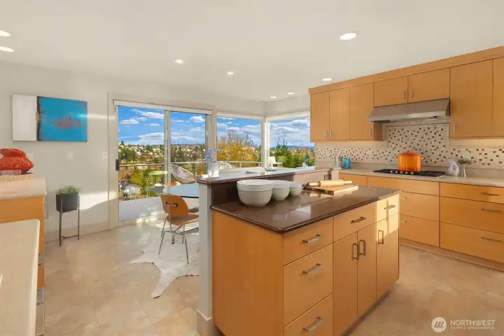 A slider opens the kitchen to that awesome view deck.