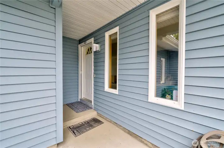 East facing covered entry keeps you and your guests out of the elements.