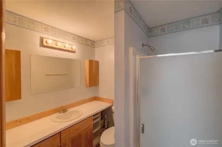 Private ensuite completes the primary bedroom.