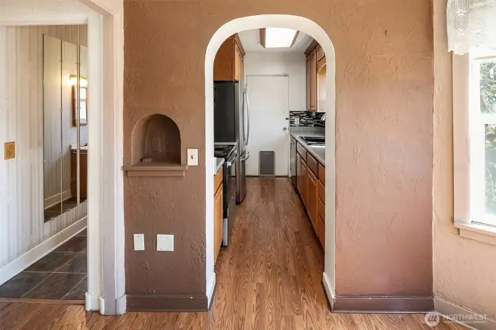 Sculptured doorways throughout the home take you back in time...There is even a matching sculputured telephone rest in the wall.