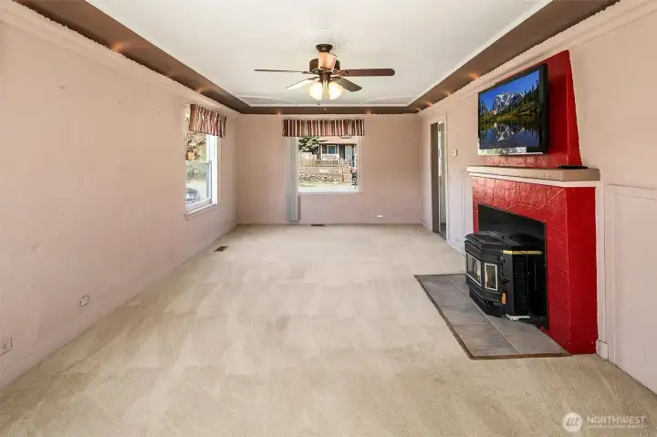 When viewing home, be sure to note the "pie crust" wall design with inset lighting around living room