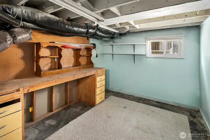 Inside of garage, built in cabinets and counter space
