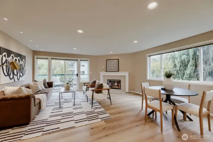 Open Living - Windows on Every Wall, Flooded with Light, Cozy Gas Fireplace & Views of Your Own Creekside Sanctuary