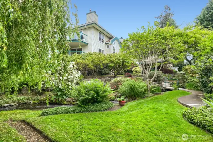 Come Home to Your Own Arboretum! Creekside Mature Growth & Gardens Surround this Downtown Edmonds Condo Retreat. Trails, Multiple Patios & Sitting Areas Throughout Create a Unique Parklike Setting.