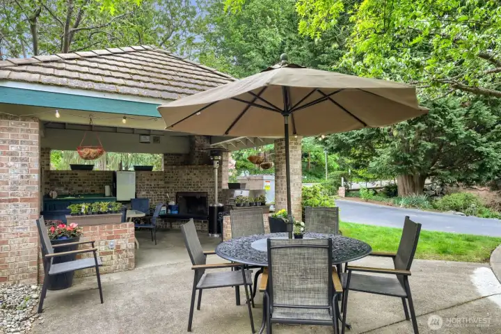 Community Amenities Include a Covered Entertainment Patio with Wood Burning Fireplace, Dining, Barbecue and Tables for Your Outdoor Enjoyment