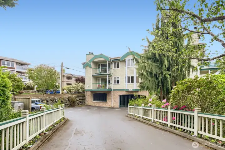 Cross the Creekside Bridge to 2 Dedicated Parking Spaces in the Gated Garage. Elevator Goes Direct from Garage to the Condo's Floor.