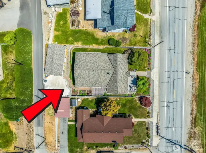 Parking area off paved alley