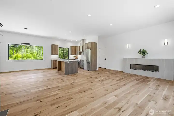 Spacious open-concept living area filled with natural light and contemporary finishes. Spacious open-concept living area filled with natural light and contemporary finishes.