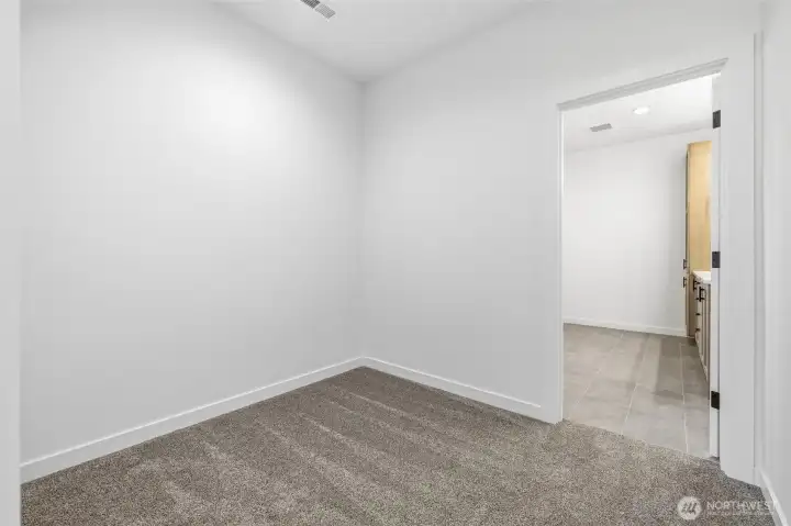 Large walk-in closet Large walk-in closet