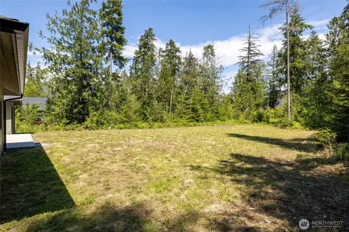 Large private yard offering room to play, garden, or entertain. Large private yard offering room to play, garden, or entertain.