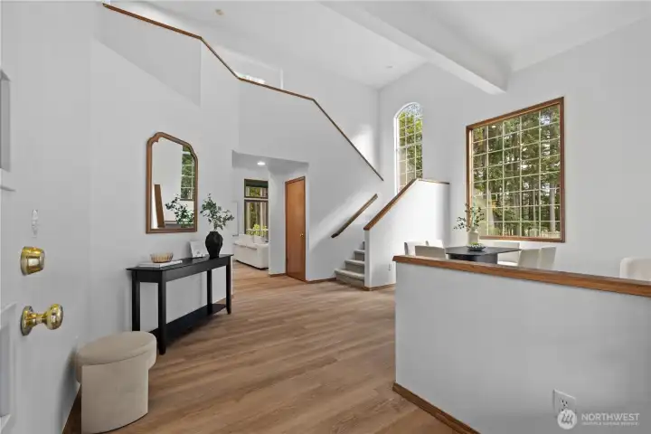 Enter to vaulted ceilings, brand new floors and fresh paint