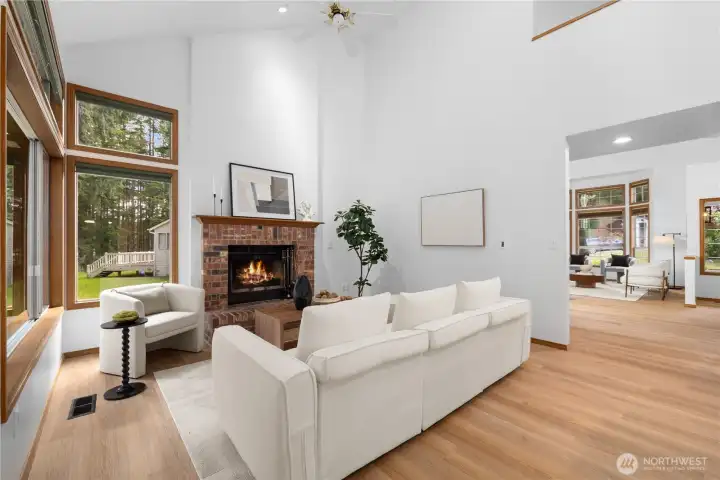 Family room includes cozy wood burning fireplace