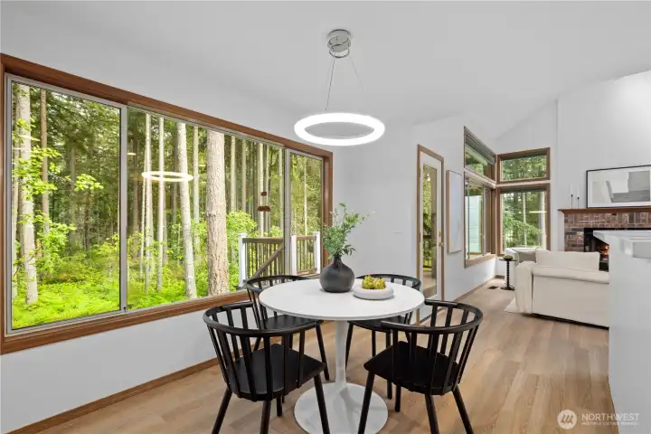 Dining area off kitchen overlooks private wooded greenbelt