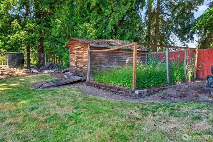 Tons of room for a garden. Large shed for all of your lawn equipment.