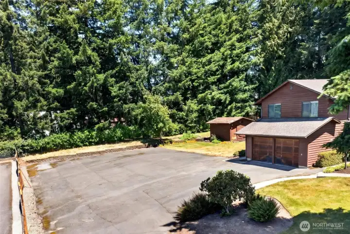 Sewer connection is in the driveway.