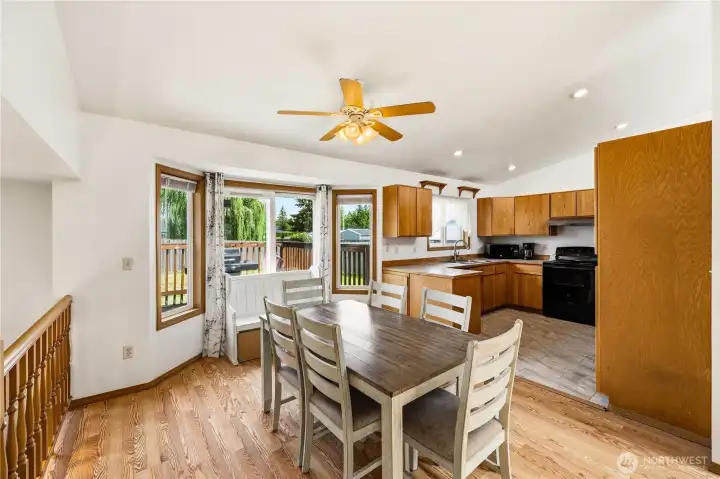 Dedicated dining space with view from bay window