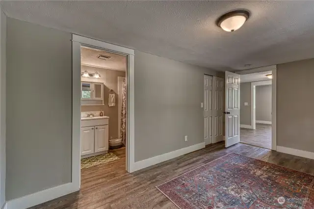 Bedroom #3 features its own full bath like the other bedrooms, all have their own baths. Looking through the door is the potential living room and office, you make the call.