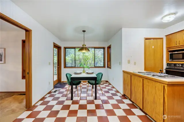 Kitchen also has vintage ceramic tile floors.