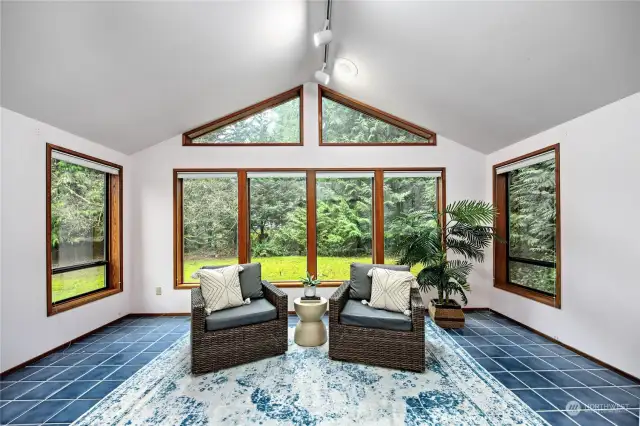 Sunroom off primary bedroom.