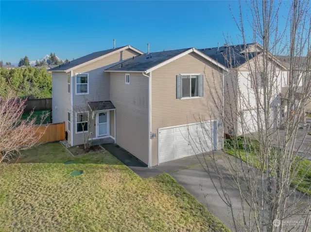 Two car attached garage plus driveway parking.