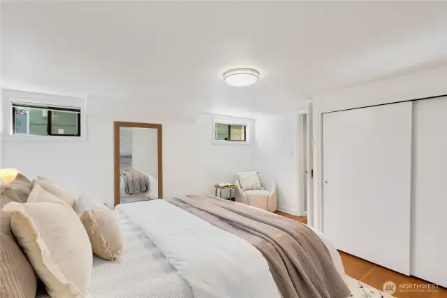 lower level bedroom with fir floors