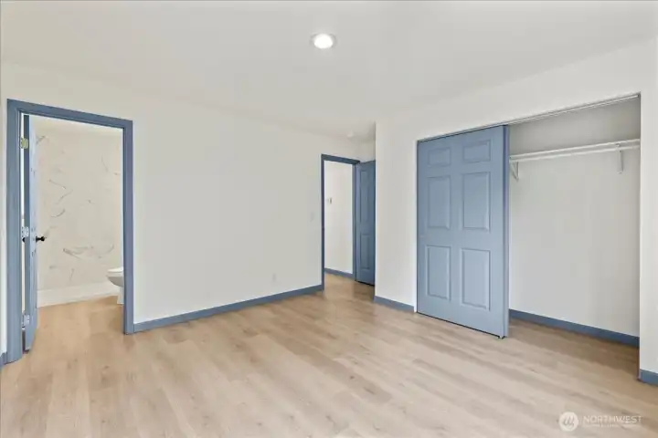 Primary Bedroom; en-suite bath is to the left, hallway is in the middle, closet is on the right.