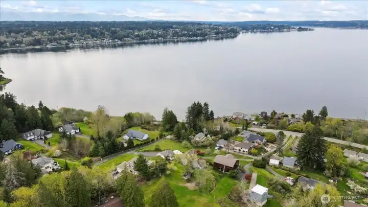 Enjoy both the sunrise and sunset facing North with unobstructed 180 degree views.