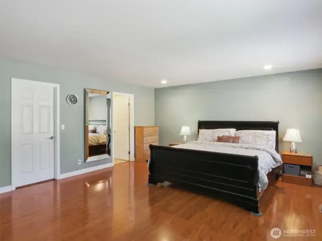 Significantly larger than typical primary bedrooms, comfortably accommodates a king-sized bed with plenty of room to spare.