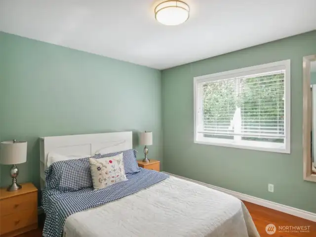 This hallway bedroom's design emphasizes both comfort and the creation of an atmosphere conducive to a restful night's sleep.