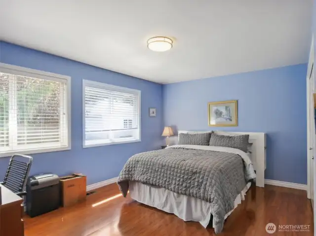 The largest of the three hallway bedrooms offers the added bonus of a nook, ideal for a quiet study or pursuing hobbies.