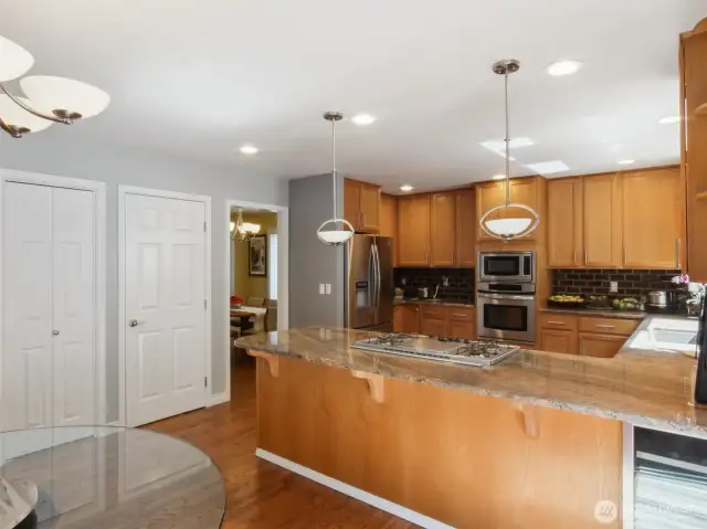 Panty closets and beautiful oak cabinets offer improved organiztion and sortage capacity.