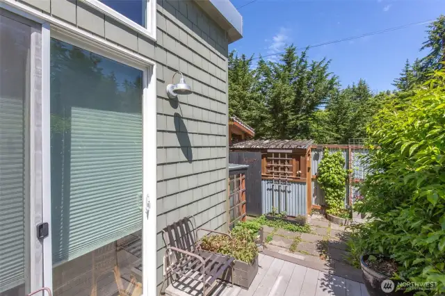 Storage shed next to garden