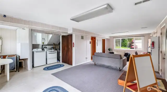 This generous multipurpose room awaits—ideal for setting up your washer and dryer, which are included, along with plenty of space for your other needs