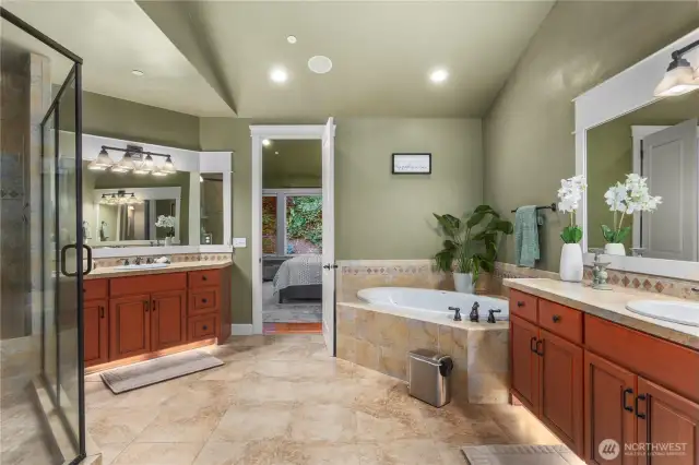 Primary Ensuite bathroom with tub, shower and private toilet