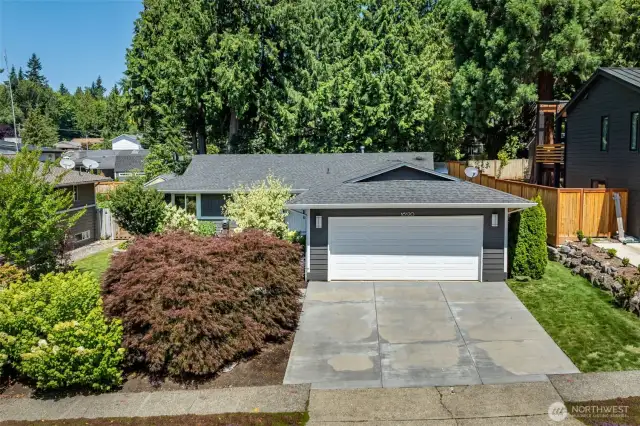 Nicely set on the "higher" side of the street with a gently sloped diriveway
