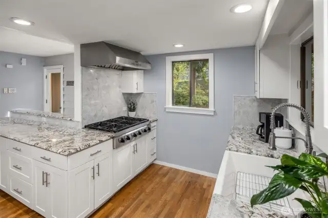 The large kitchen has expansive counter space for meal prep and a large sink, both helpful for cooks of all skill levels.