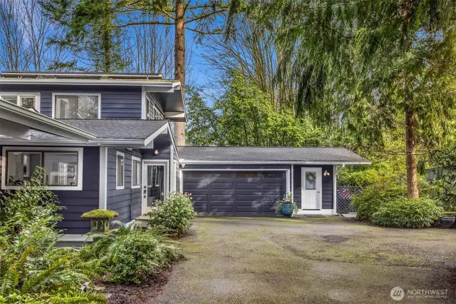 The original carport was enclosed. A studio/office space is adjacent and has its own entry.
