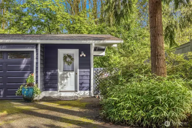 There is an additional office space or storage option next to the garage.
